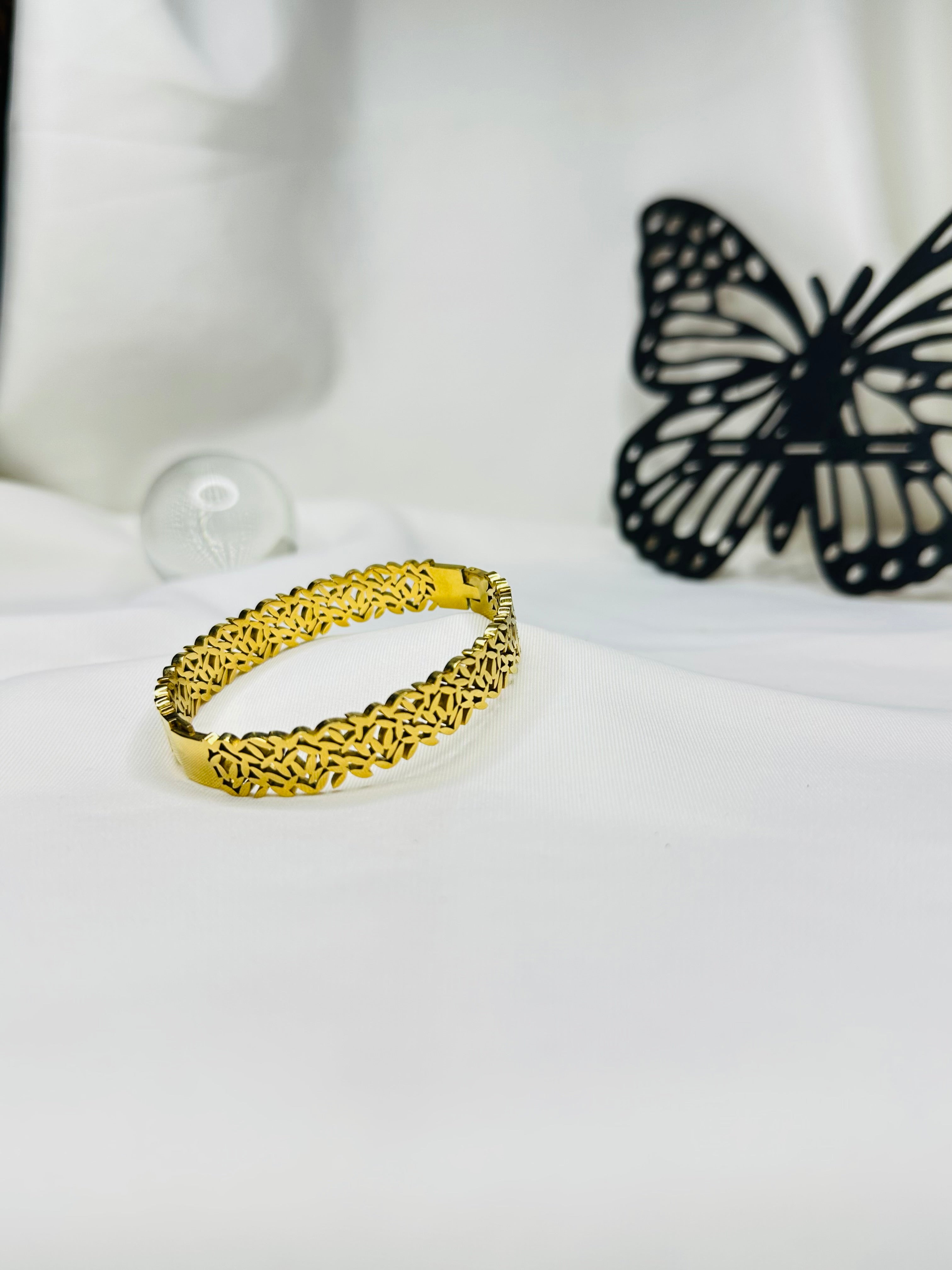Golden Harmony Gold Plated Stainless Steel Bangle for Women | Elegant Textured Designer Bracelet