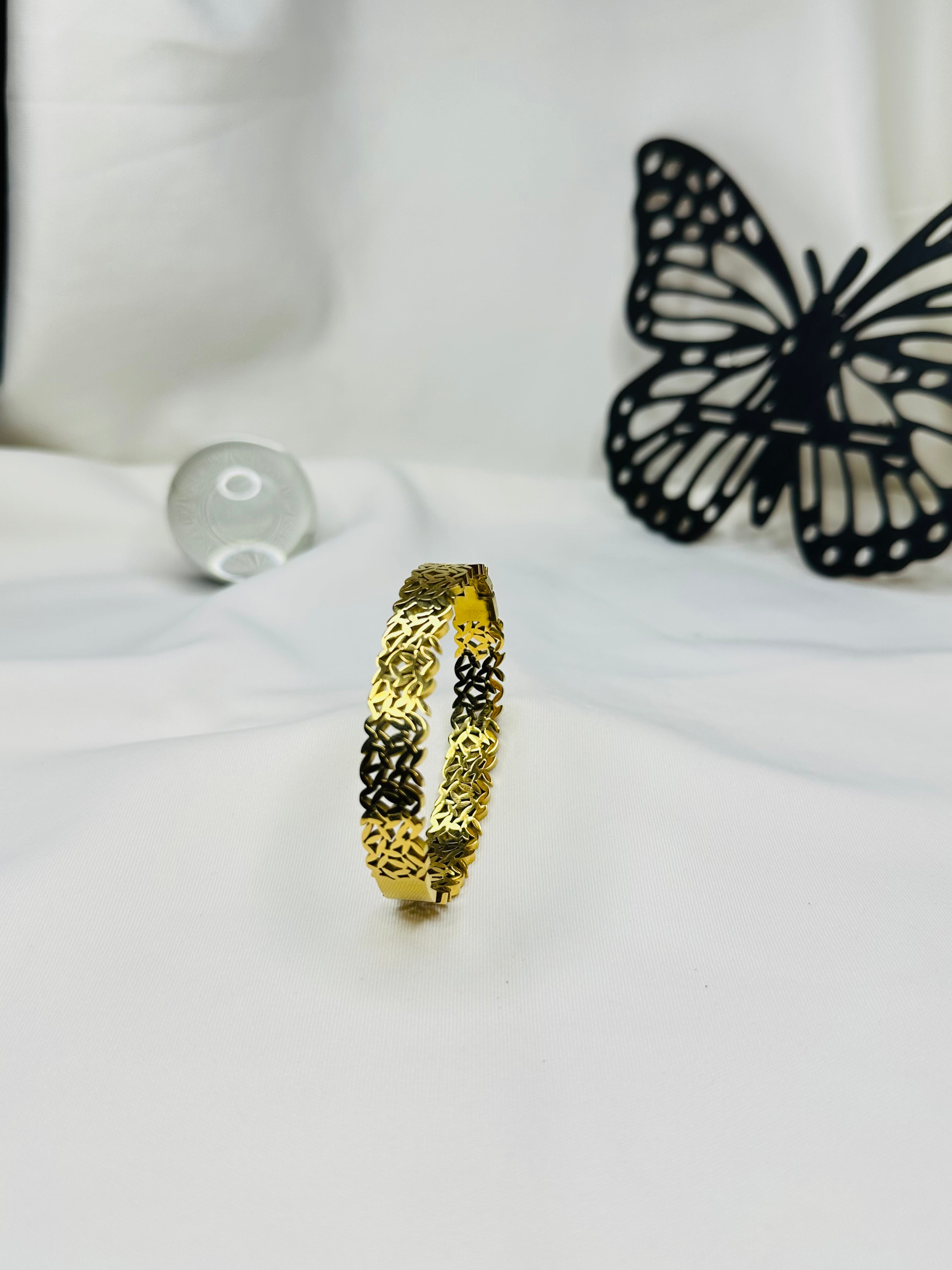 Golden Harmony Gold Plated Stainless Steel Bangle for Women | Elegant Textured Designer Bracelet