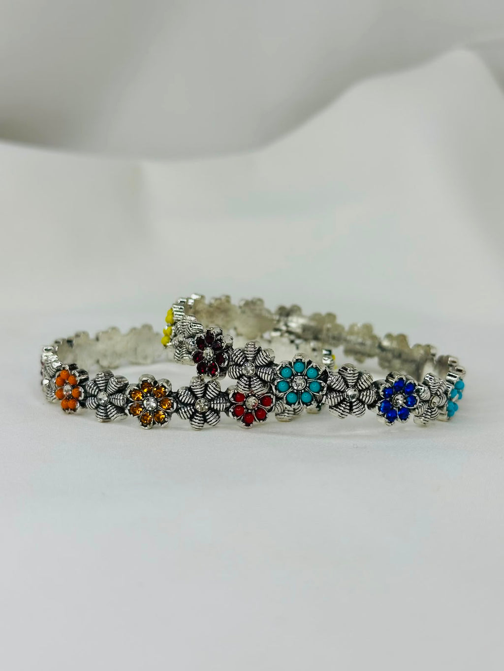 Multicolor Floral Oxidized Golden And Silver Bracelet Set
