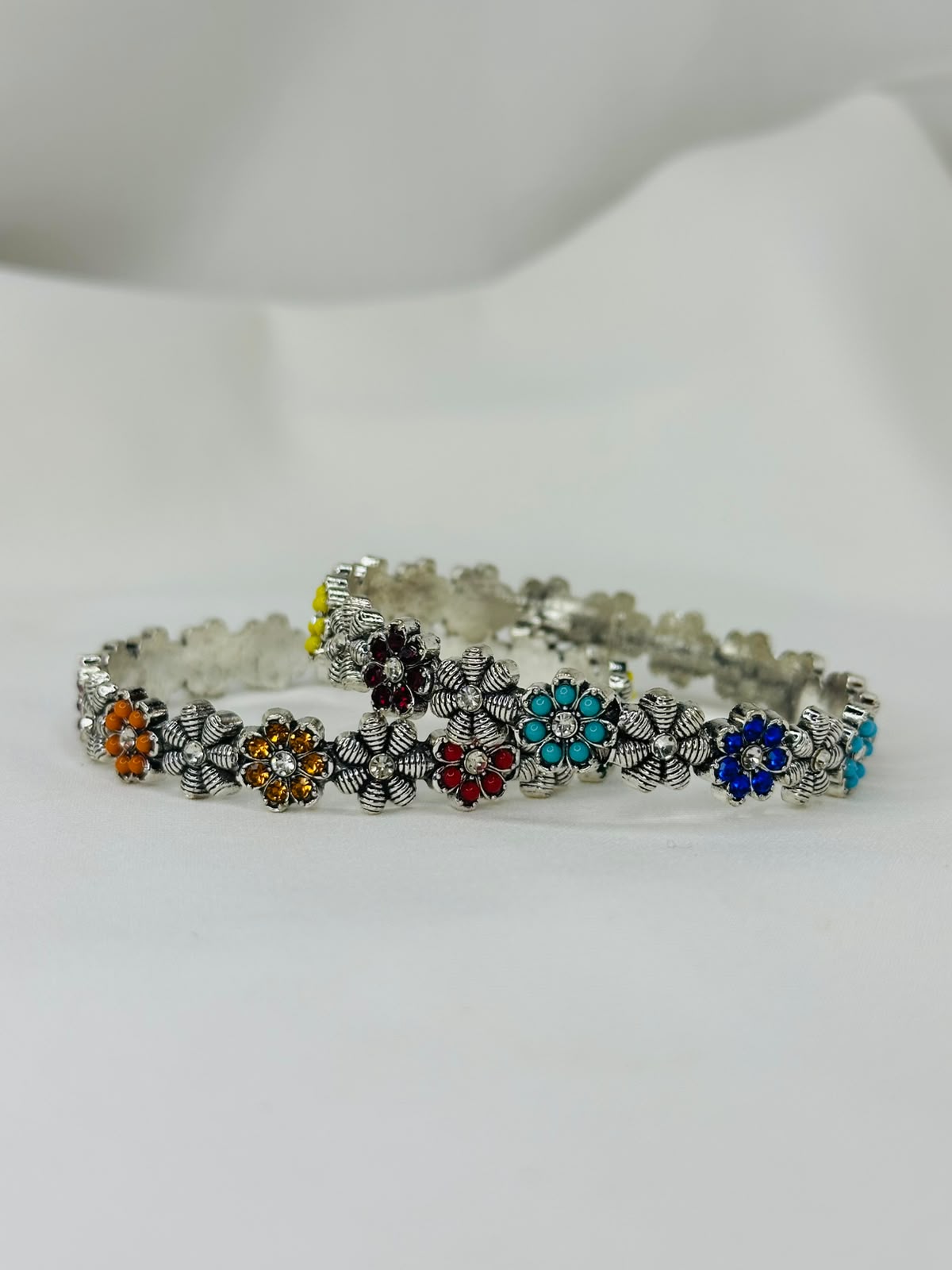 Multicolor Floral Oxidized Golden And Silver Bracelet Set