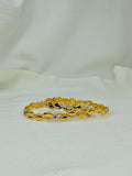 Golden Leaf Twist Bangles – Elegant Crystal Accent Set
